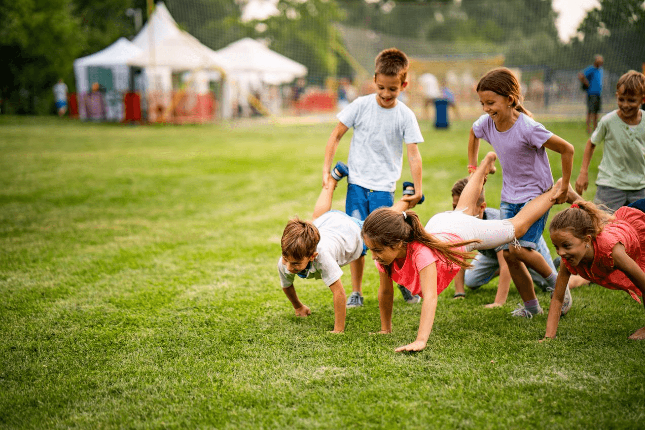 Kids playing in a field.